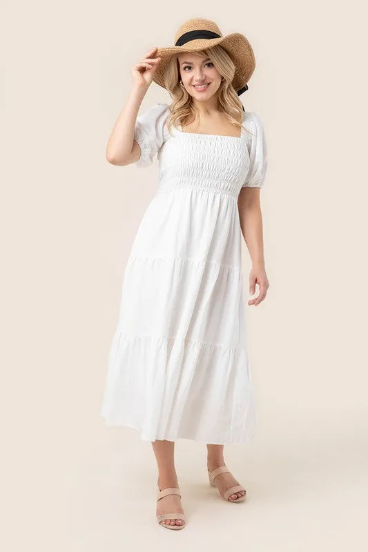 Tiered long dress with puff sleeves